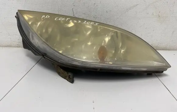 Mitsubishi Colt Headlight/headlamp MR957354 0301208202