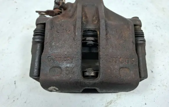 Volkswagen PASSAT B5 Front brake caliper 