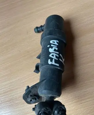 Headlight washer spray nozzle