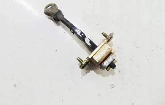 Subaru Legacy Front door check strap stopper