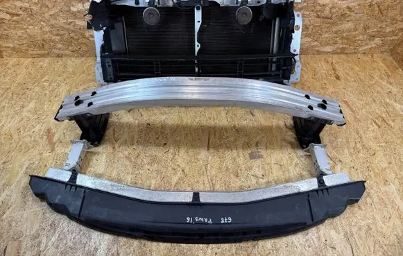Radiator support slam panel