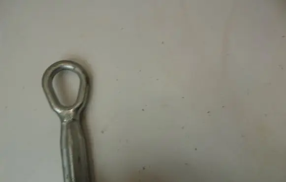 Towing hook eye