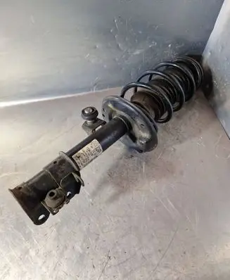 Opel Corsa D Front shock absorber with coil spring 13343099 3310