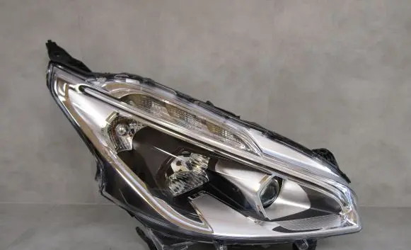 Peugeot 208 I Headlight/headlamp 9810805880