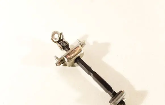 Subaru Legacy Rear door check strap stopper