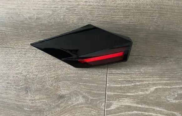 Rear/tail light trim molding