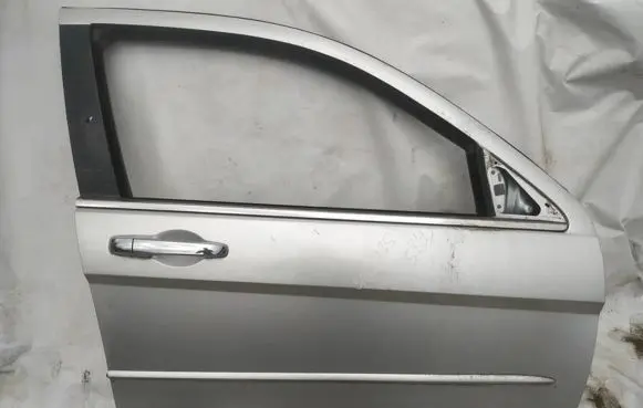Chrysler Sebring (ST-22 - JR) Front door pilkos