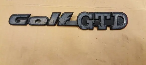 Volkswagen Golf I Manufacturers badge/model letters 191853687P
