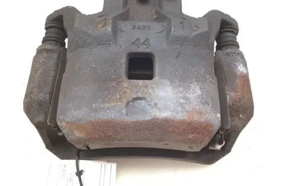 Nissan Juke I F15 Front brake caliper