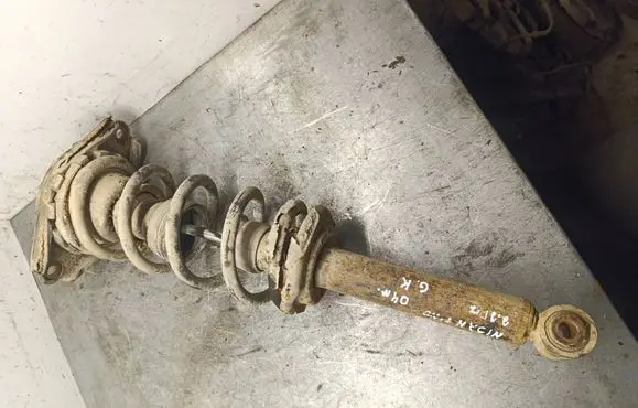 Nissan Almera Tino Rear shock absorber with coil spring 