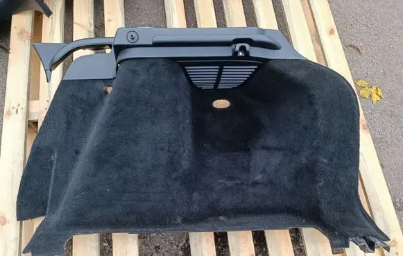 Trunk/boot lower side trim panel