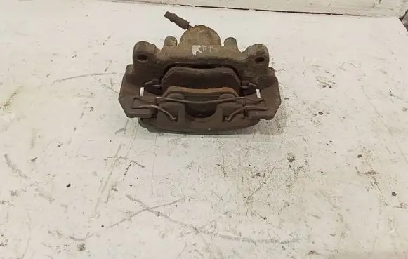Volkswagen Touran I Front brake caliper