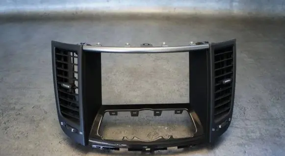 Infiniti FX Dash center air vent grill P10421B11000