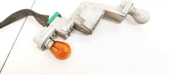 Volvo V50 Tail light bulb cover holder