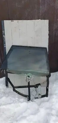 Rear door manual window regulator