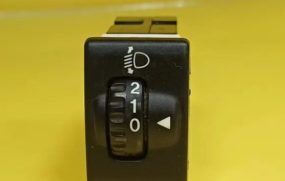 Headlight level height control switch