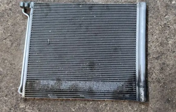BMW X5M E70 Coolant radiator 9166098 64509166098 64509239944