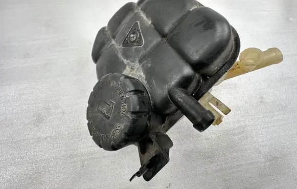 Mercedes-Benz GL X166 Coolant expansion tank/reservoir 1665000049