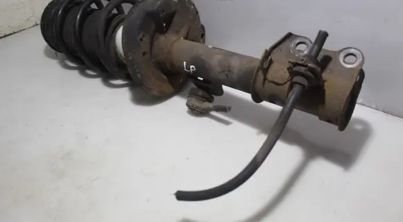 Front shock absorber with coil spring
