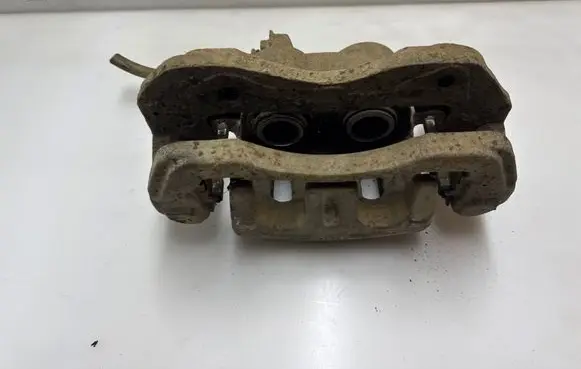 Mitsubishi Pajero Front brake caliper 