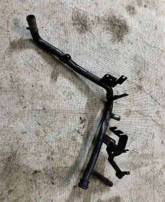 Volkswagen Golf IV Engine coolant pipe/hose 038121065A