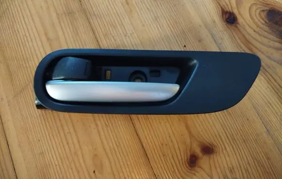 Mazda 3 II Front door interior handle