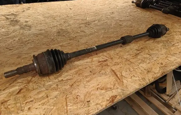 Opel Astra J Front driveshaft 13335161