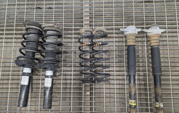 Volkswagen Touran I Set of springs and shock absorbers (Front and rear) 317572 36K78A 824904013017