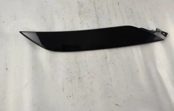 Toyota bZ4X Under headlight/headlamp trim 5271242030