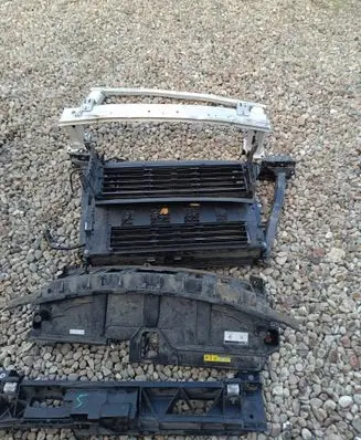 Radiator support slam panel