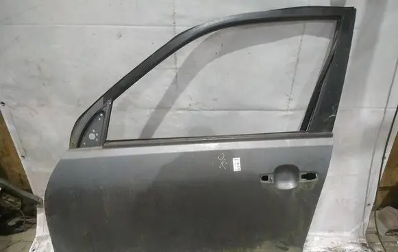 Suzuki Grand Vitara II Front door PILKOS