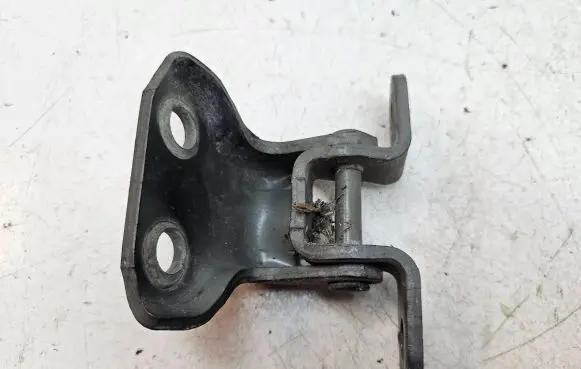Front door lower hinge