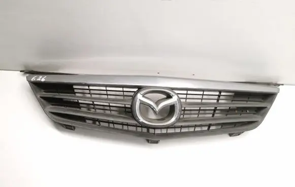 Mazda 626 Front bumper upper radiator grill GG2M50712