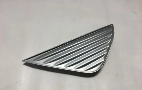 Toyota Aygo AB40 Under headlight/headlamp trim 52116-0H050