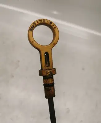 Oil level dip stick