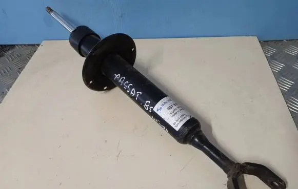 Volkswagen PASSAT B5 Front shock absorber/damper 557837
