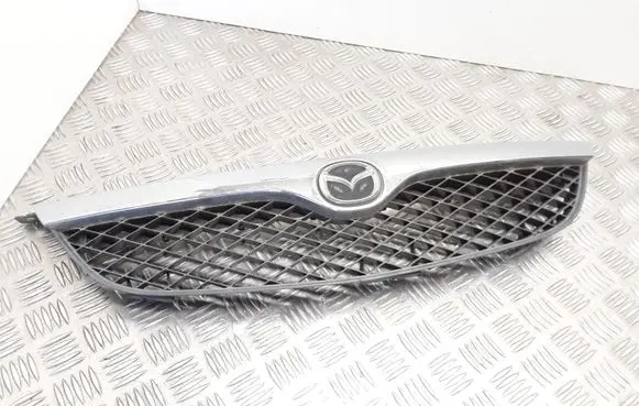 Mazda 626 Front bumper upper radiator grill GE4V50719