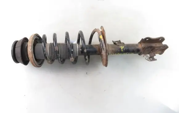 Suzuki Swift I Front shock absorber with coil spring 4160162J31