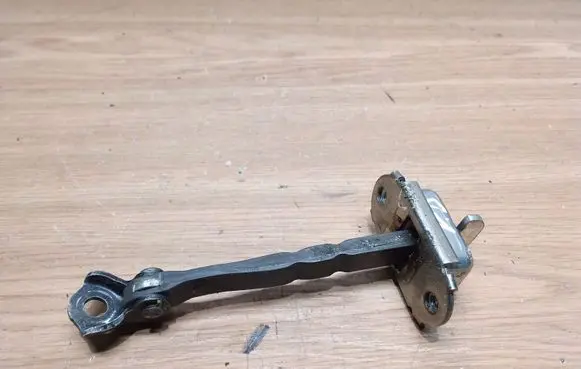 Toyota Yaris Front door check strap stopper