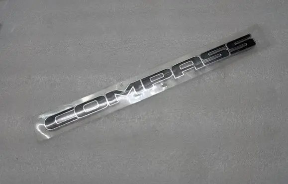 Jeep Compass Front door emblem/model letters K68305595AB
