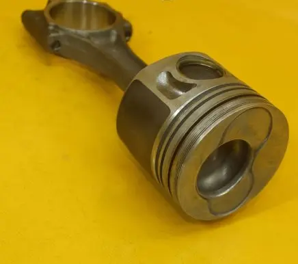 Volkswagen Golf V Piston with connecting rod 038G