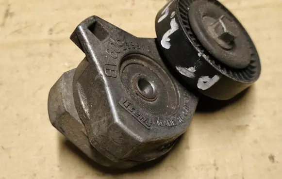 Chrysler PT Cruiser Generator/alternator belt tensioner 04668509AB