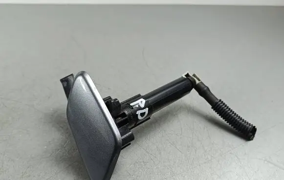 Mitsubishi Outlander Headlight washer spray nozzle