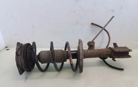 Nissan Note (E11) Front shock absorber with coil spring
