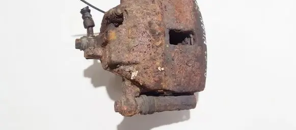 Nissan Almera N16 Front brake caliper