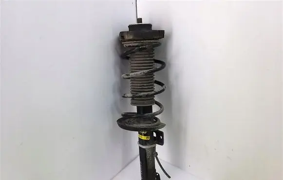 Volkswagen Polo Front shock absorber with coil spring