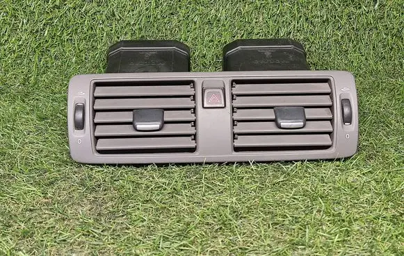 Dash center air vent grill