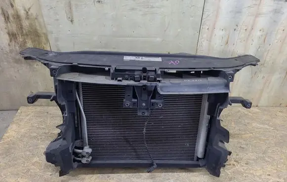 Volkswagen PASSAT B7 Radiator support slam panel 1K0121253BB