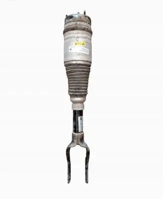 Jeep Grand Cherokee Front shock absorber with coil spring 68231884AA