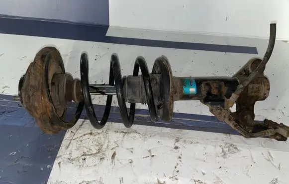Front shock absorber with coil spring